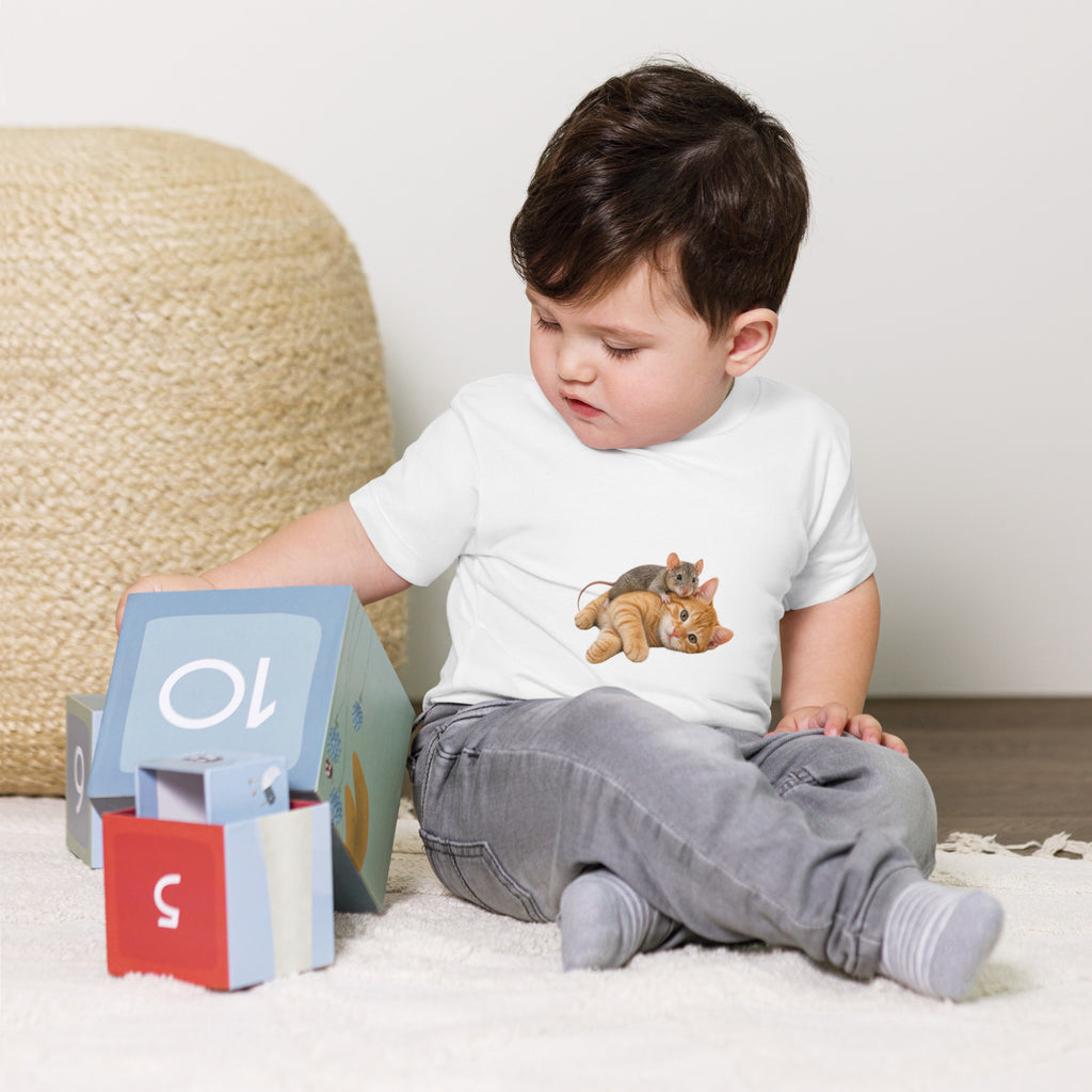 Child playing in white toddler animal graphic T-shirt